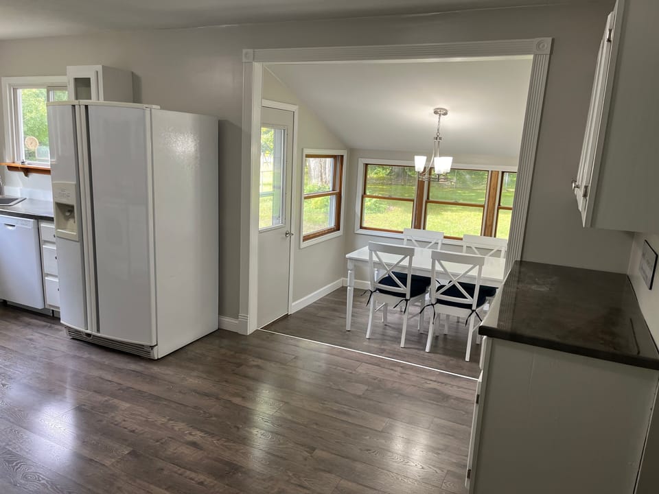 Full size refrigerator Dining Room Table with extra chairs