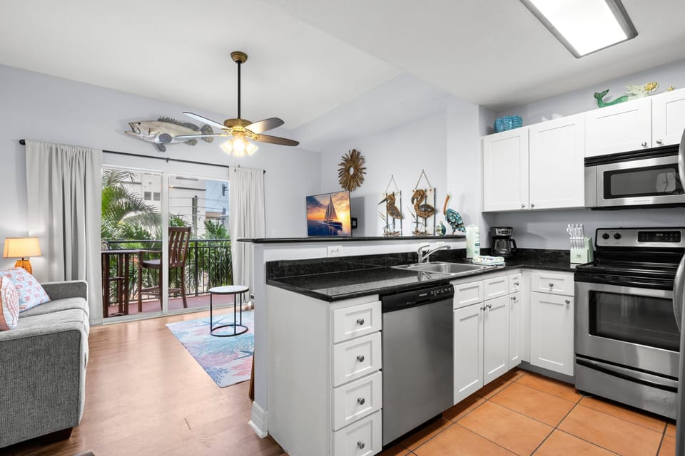 The full kitchen is stocked with pots, pans, and all the essentials—including a coffee maker, toaster, crock pot, and blender. It has everything you'd expect at home, so you can prepare meals in-house and save money during your stay.