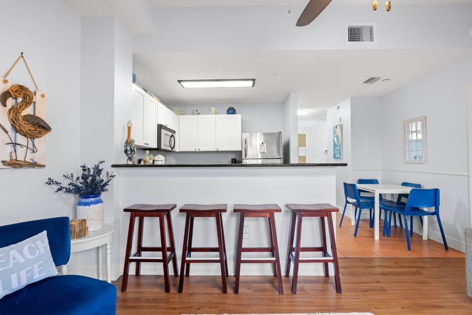Bar seating at the kitchen countertop.