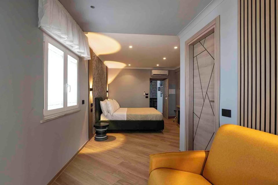 Deluxe Double Room, City View | In-room safe, blackout drapes, soundproofing, iron/ironing board