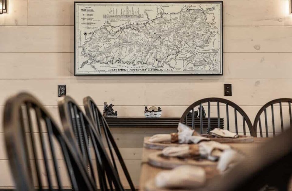 Rustic dining area featuring a detailed map of great smoky mountains national park.