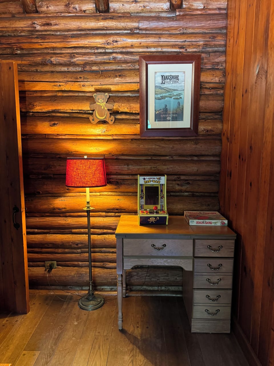 Desk and PAC Man in bunk room