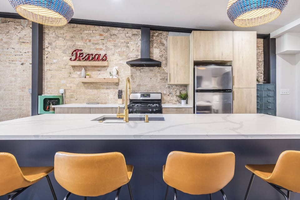 Gourmet kitchen with large countertop and seating