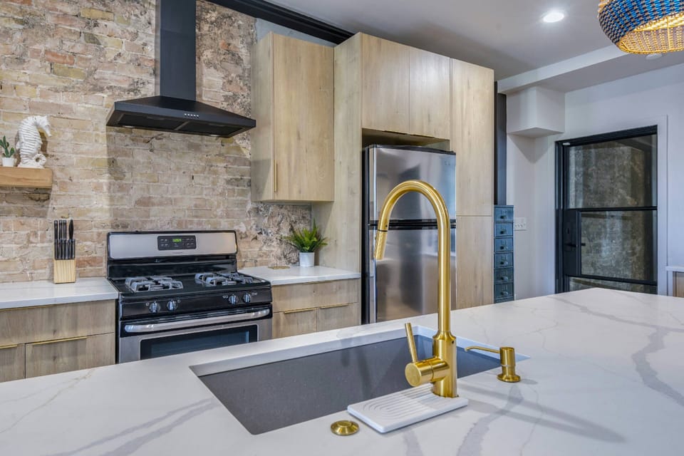 Gourmet kitchen with large countertop and seating