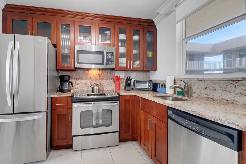 The kitchen is well equipped with full size oven, dishwasher, refrigerator/freezer and microwave.