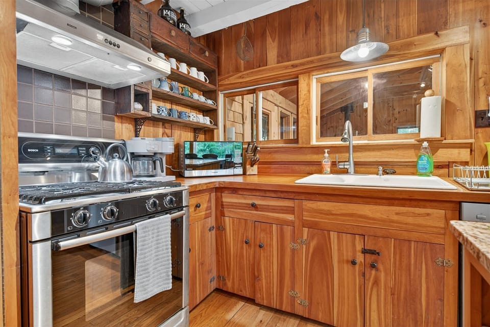 Brew your morning coffee, prep a hearty breakfast, or whip up dinner in this charming kitchen—stocked with everything you need!