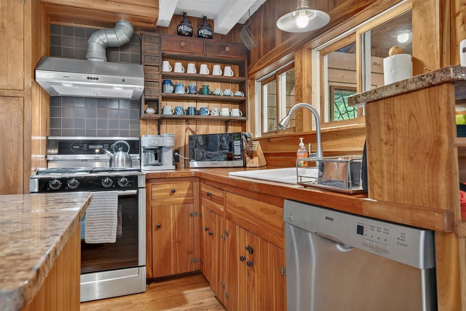 Brew your morning coffee, prep a hearty breakfast, or whip up dinner in this charming country kitchen—stocked with everything you need!