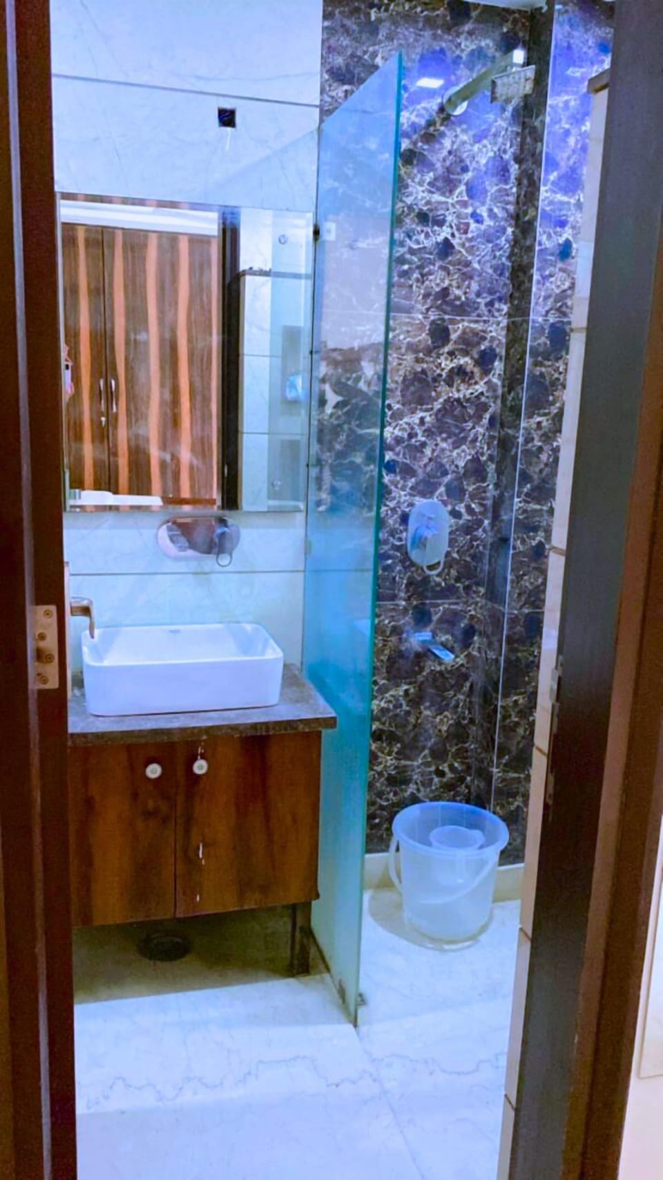 Shower, designer toiletries, hair dryer, bathrobes