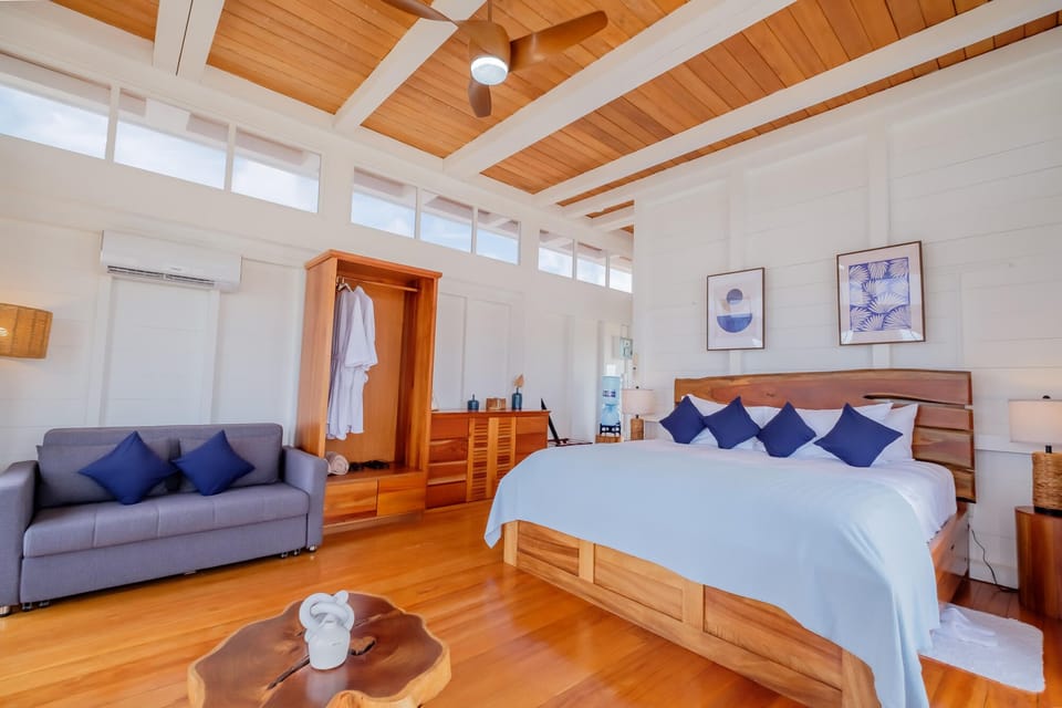Stretch out in a spacious suite with warm wood finishes.