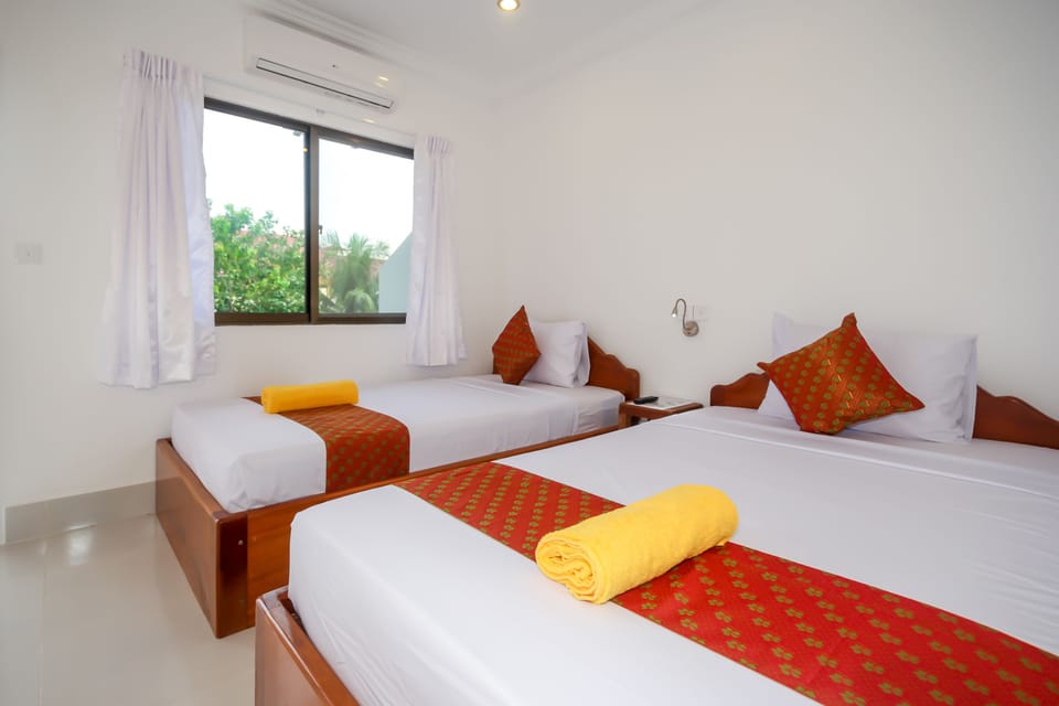 Deluxe Twin Room, Balcony | Minibar, in-room safe, desk, free WiFi