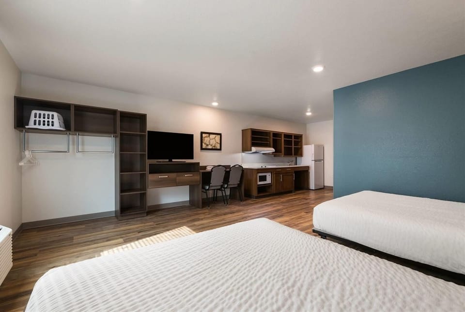 Imagine spreading out with kitchenette, TV, and generous storage.