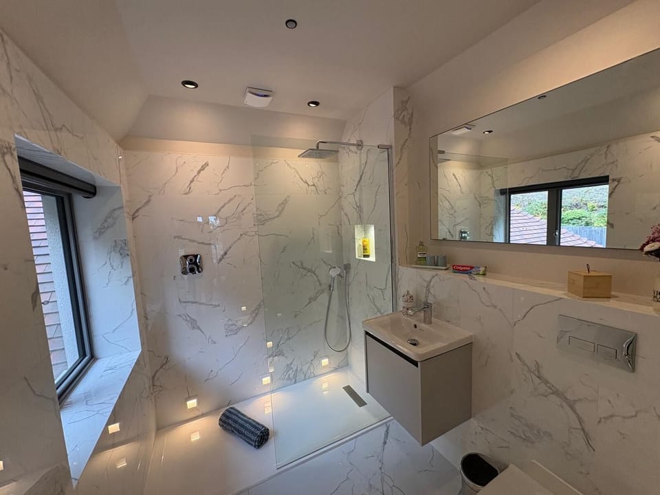 Luxury Suite, Garden View | Desk, laptop workspace, iron/ironing board, free WiFi