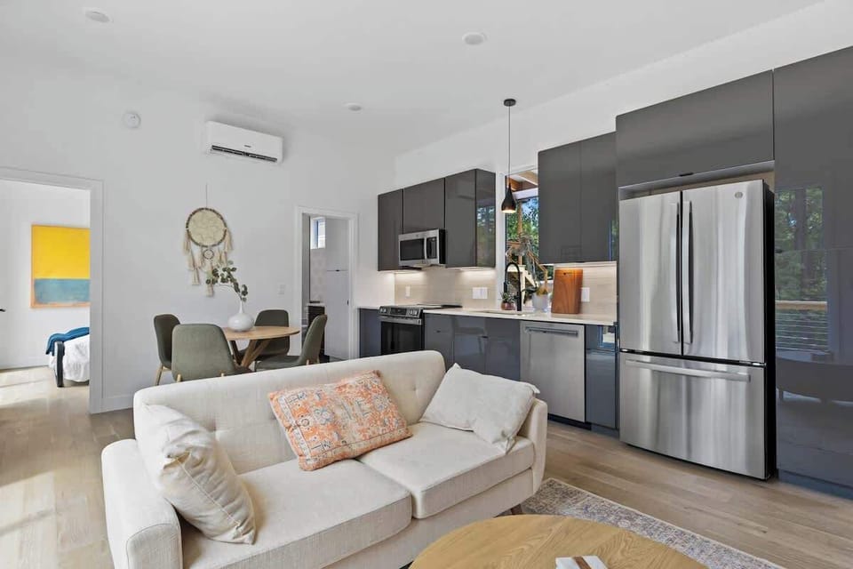 Relax on the sofa with pine-tree views.