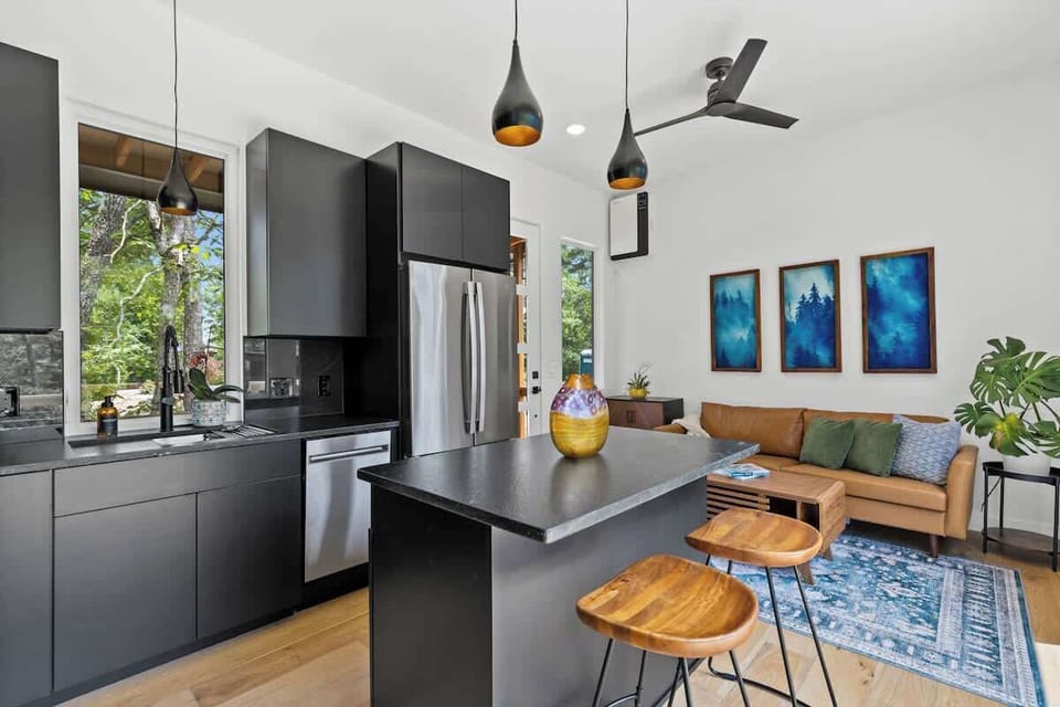 Open-concept design with stylish finishes throughout.