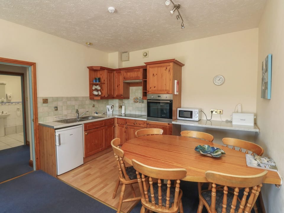 Fridge, microwave, toaster, cookware/dishes/utensils