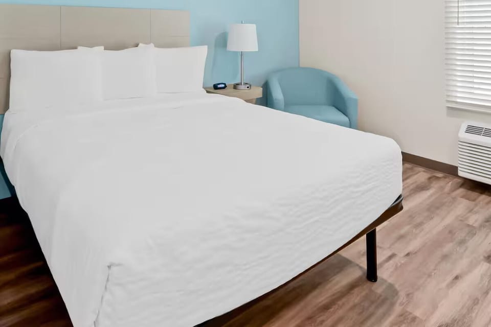 Sink into crisp linens for a quiet, restorative night.