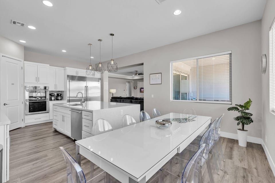 Its open-concept design flows seamlessly into the living space, perfect for cooking, entertaining, or enjoying casual meals together.