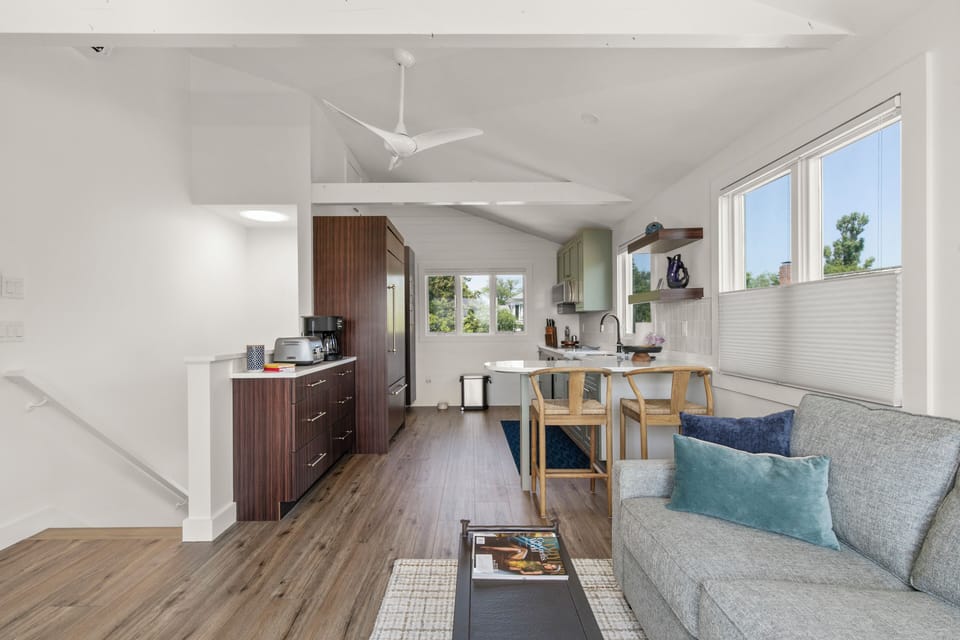 This inviting space opens directly to the private deck.