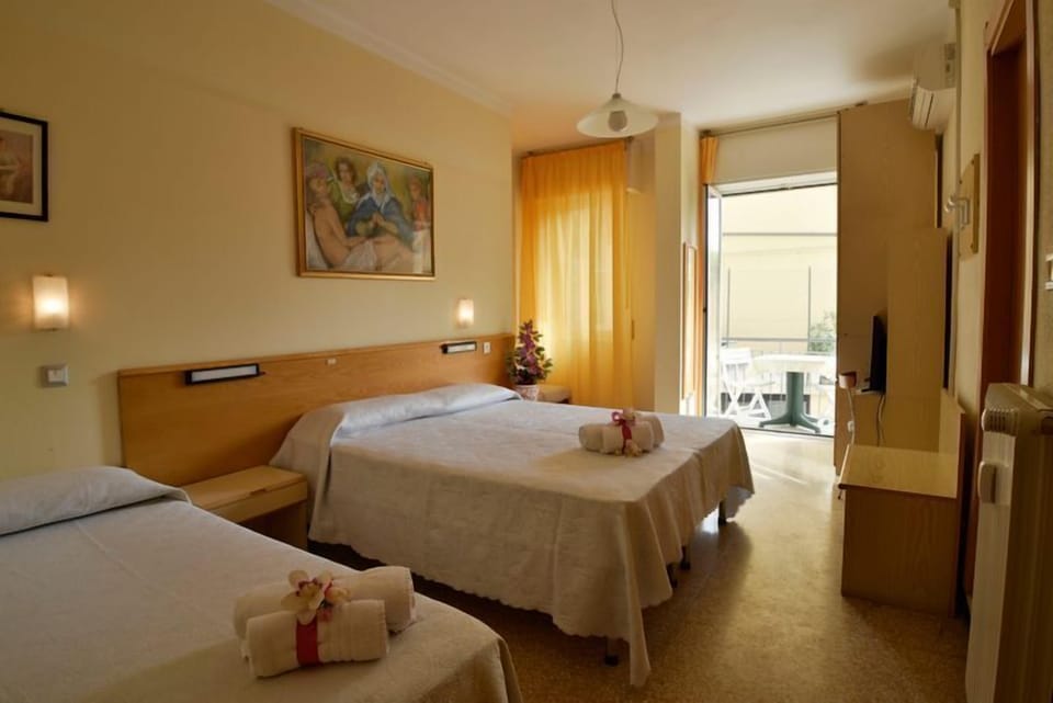 Quadruple Room | Egyptian cotton sheets, premium bedding, in-room safe, free WiFi