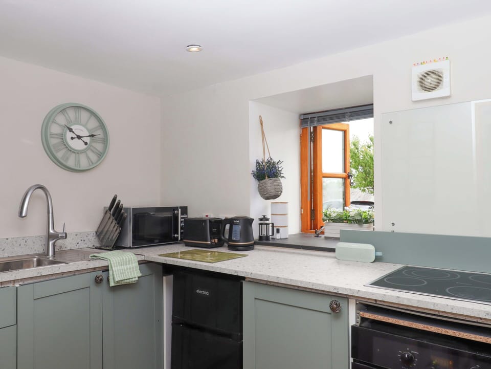 Fridge, microwave, toaster, cookware/dishes/utensils