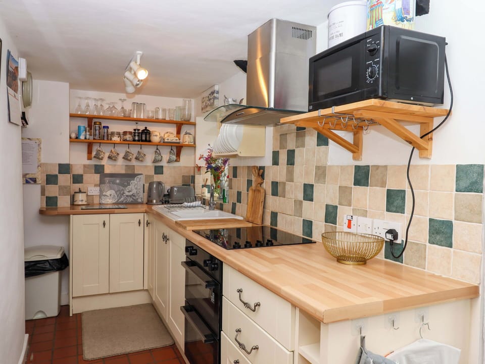 Fridge, toaster, cookware/dishes/utensils