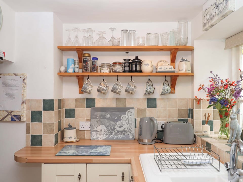 Fridge, toaster, cookware/dishes/utensils