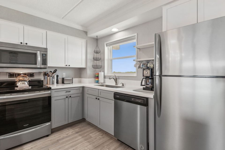 Condo, 2 Bedrooms | Private kitchen | Coffee/tea maker, fridge, oven, stovetop
