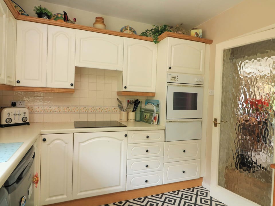 Fridge, microwave, toaster, cookware/dishes/utensils