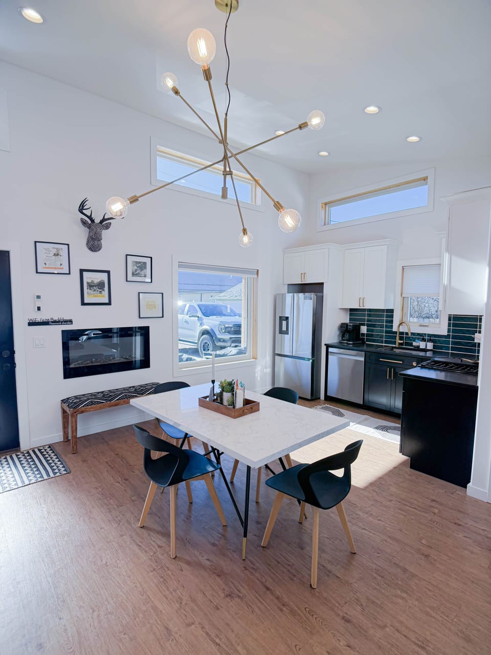 Modern dining for four. Share a meal under designer lighting after a trip to Kendrick Park.