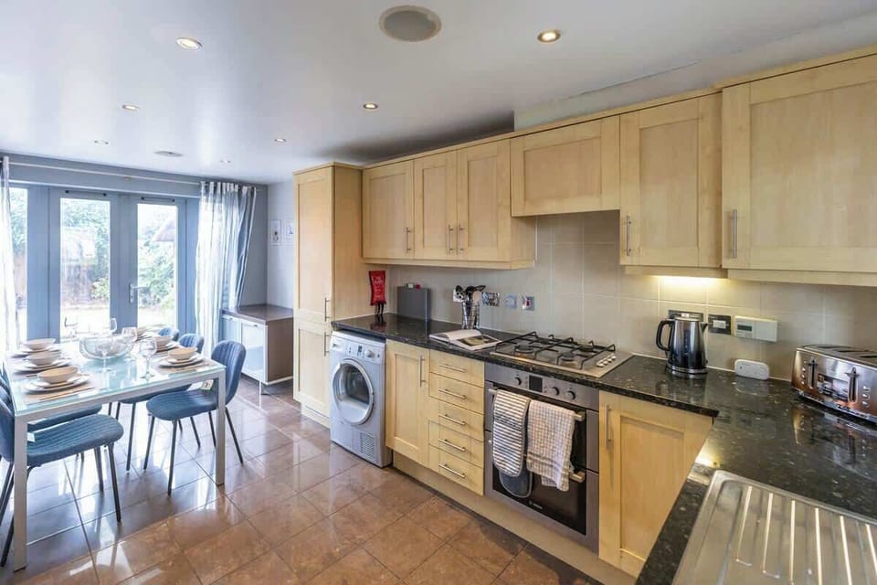 Enjoy a fully equipped, spacious kitchen — perfect for cooking your favorite meals during your stay.