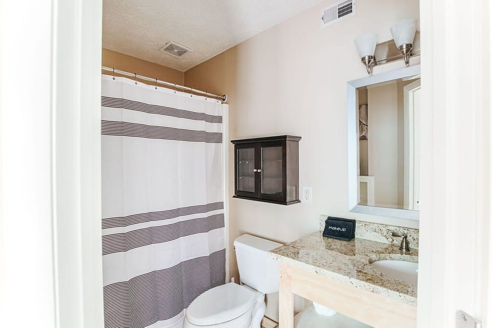Ground floor full bathroom - hallway access