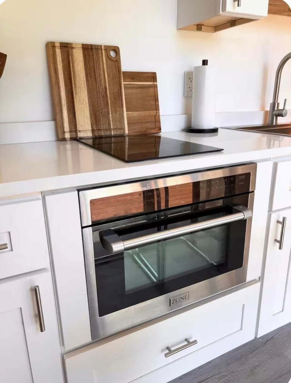 2 burner stove top, and microwave/oven combo.