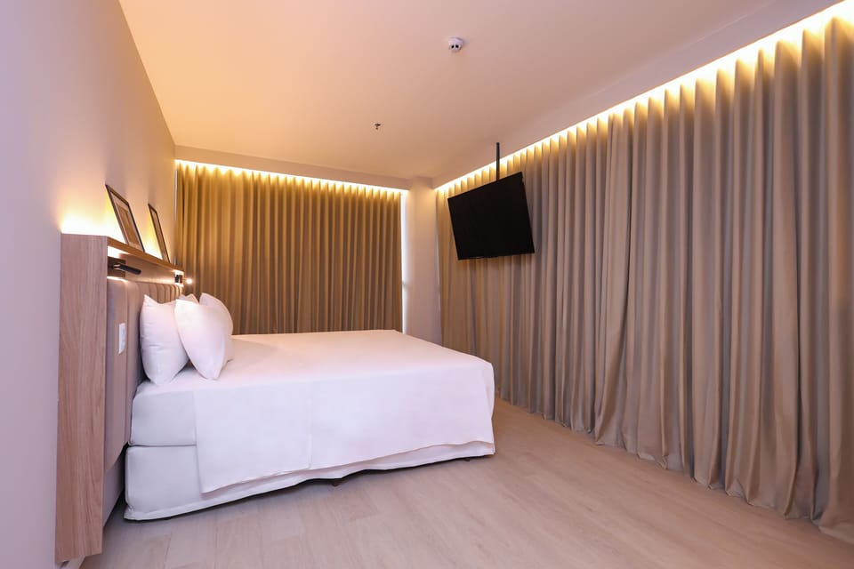 Deluxe Double Room | In-room safe, desk, laptop workspace, blackout drapes