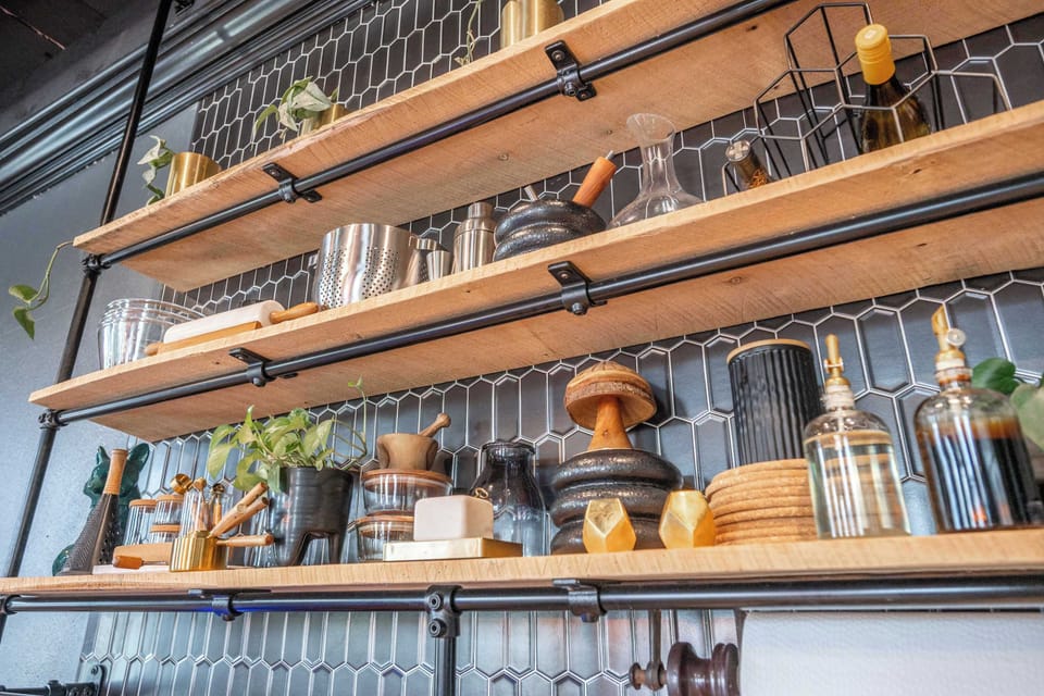 The industrial chic kitchen offers ample space & all the comforts of home ​
