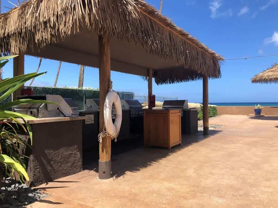 Oceanfront BBQ grills near the pool