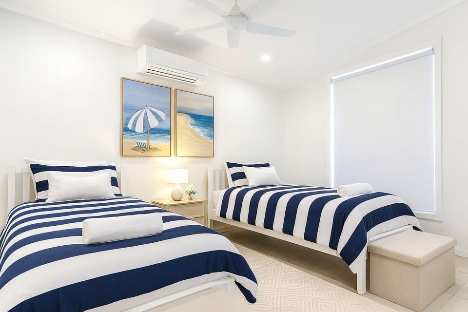 Third bedroom with two single beds, perfect for children or friends
