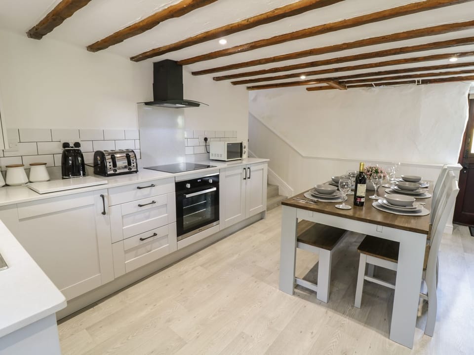 Fridge, microwave, dishwasher, cookware/dishes/utensils