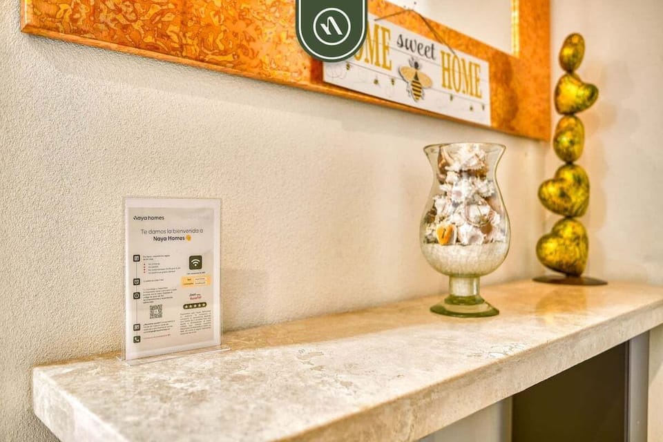 Feel right at home from the moment you arrive. We've added thoughtful coastal decor, warm accents, and a convenient welcome sign with all the details you need for a comfortable stay.
