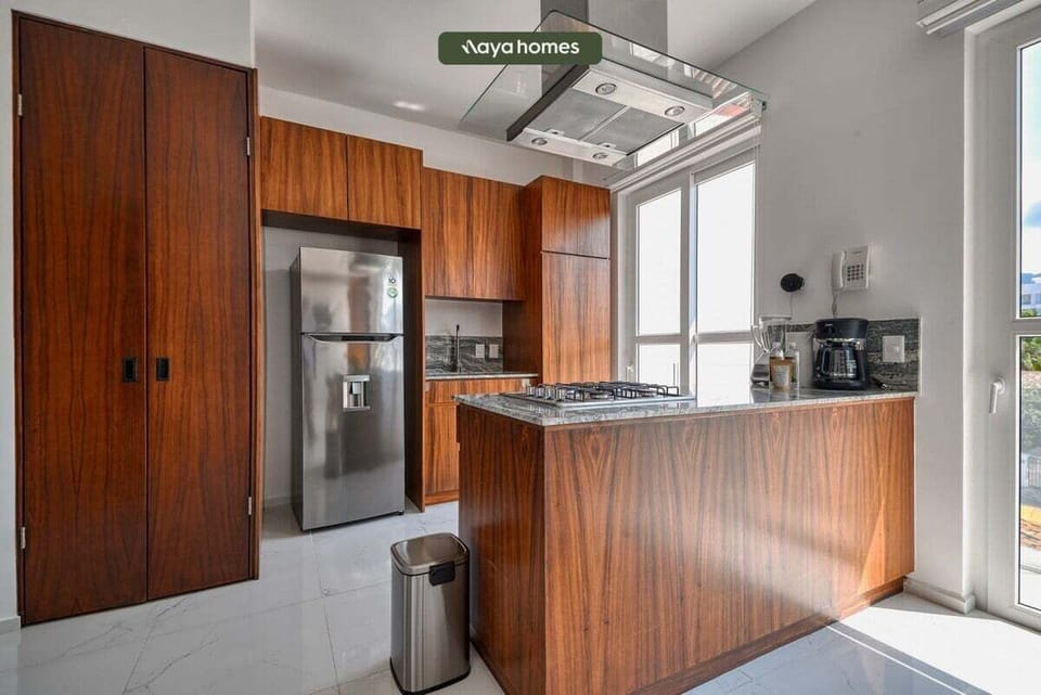 Seamless dining and kitchen layout for comfort and style.