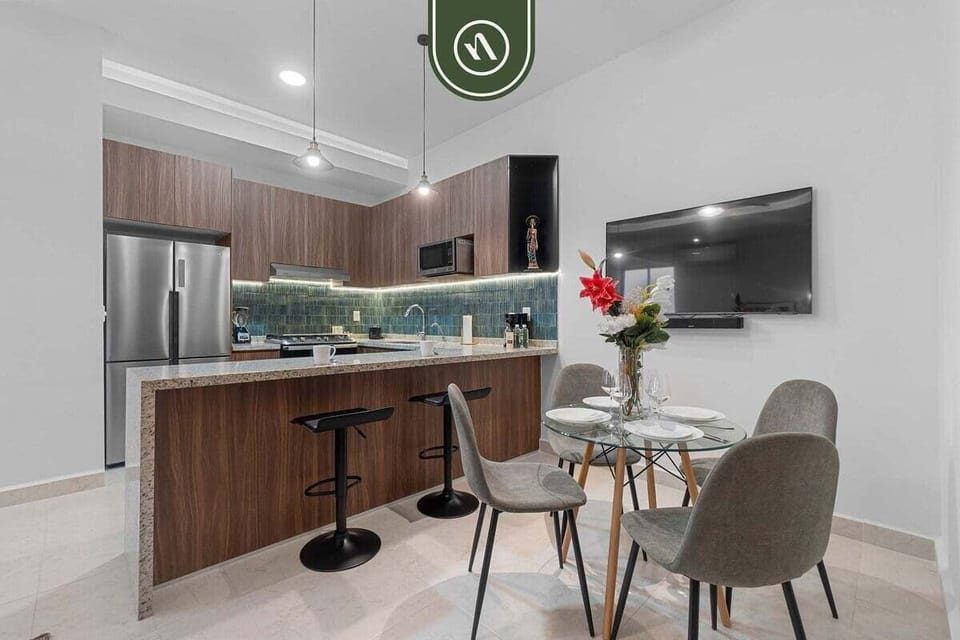 Entertain with ease in this spacious open layout. It features a massive granite peninsula with bar stool seating that flows perfectly into the dining area.