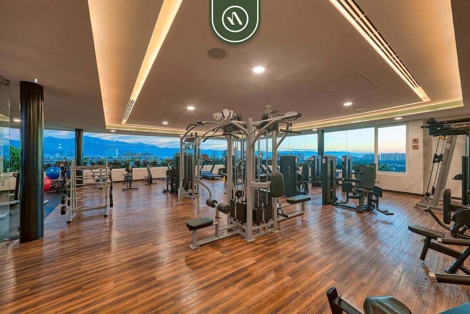 Stay active in the building's fully equipped gym, offering modern workout machines and scenic mountain views.