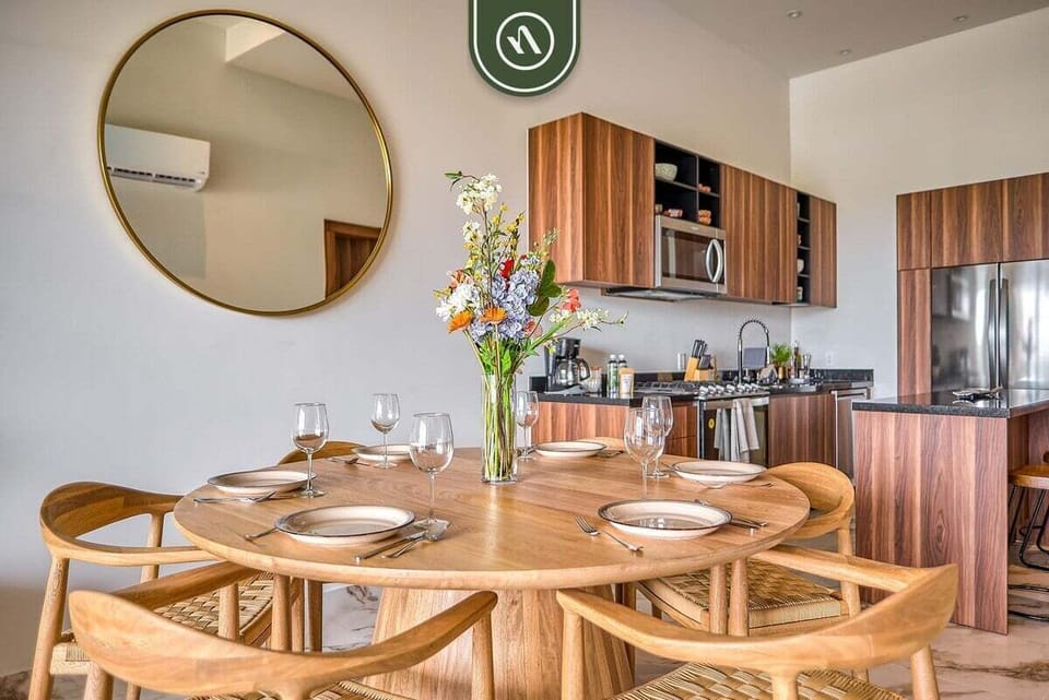Cozy living area with comfortable furnishings and integrated kitchen access.