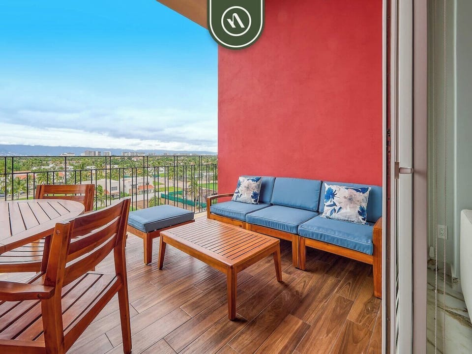 Contemporary property featuring a rooftop pool, outdoor amenities, and scenic city views.