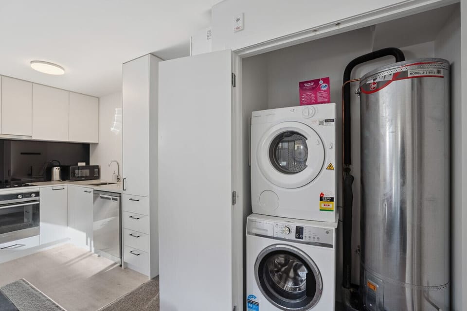 Laundry Room: Enjoy modern conveniences with in-unit washer and dryer for stress-free stays!
