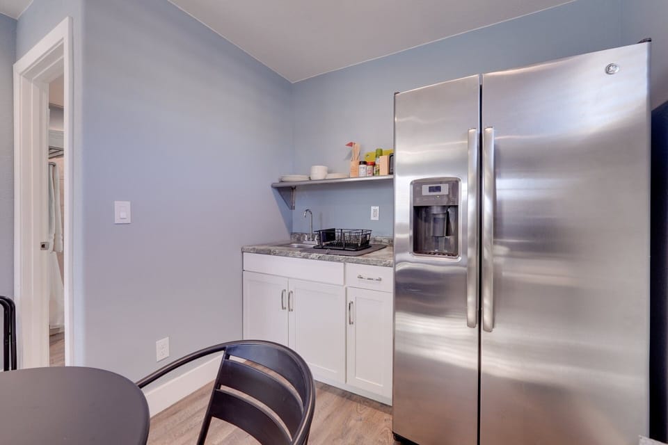 Full size fridge, microwave, toaster, electric skillet, toaster oven and sink