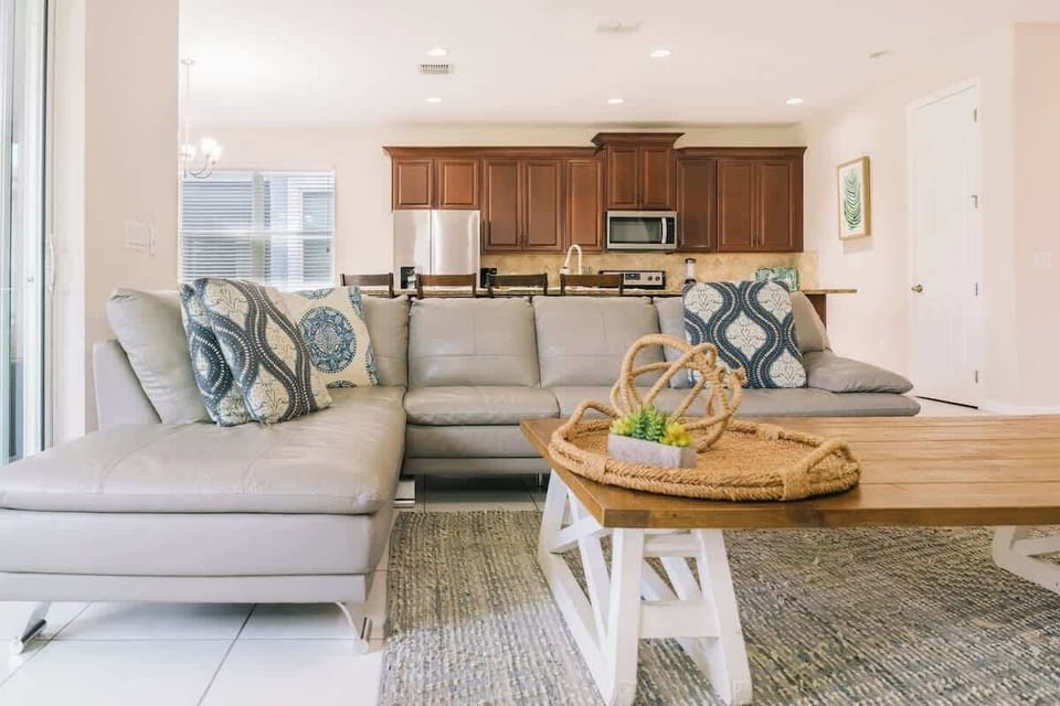 Open-concept comfort with direct access to the kitchen and dining area.


