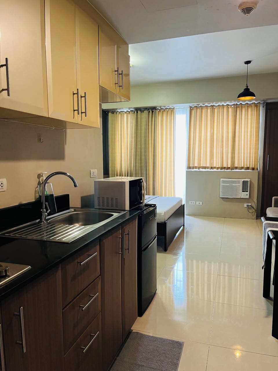 Suite, Balcony, City View | Private kitchen | Fridge, microwave, stovetop, dishwasher