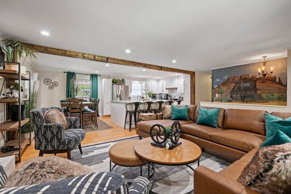 With its seamless flow between the living, dining, and kitchen areas, this space is designed for comfort, connection, and togetherness.