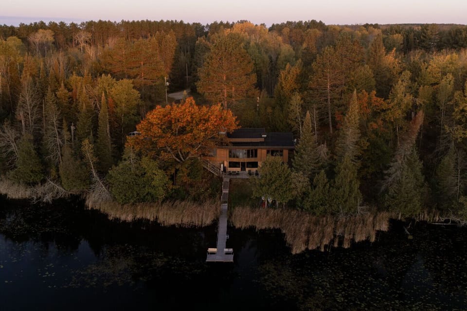 A bird’s-eye view of your secluded 30-acre Northwoods lakefront retreat.