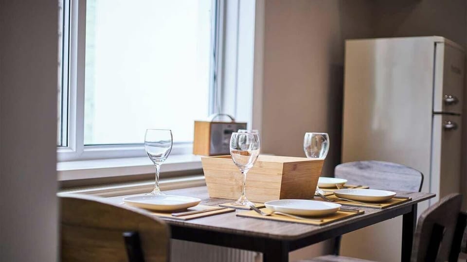 Welcoming table setting in a cozy, modern space.